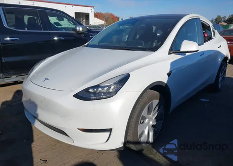 2023 Tesla Model Y Awd/Long Range Dual Motor All-Wheel Drive z USA, uszkodzony, nr VIN 7SAYGDEE7PA035771